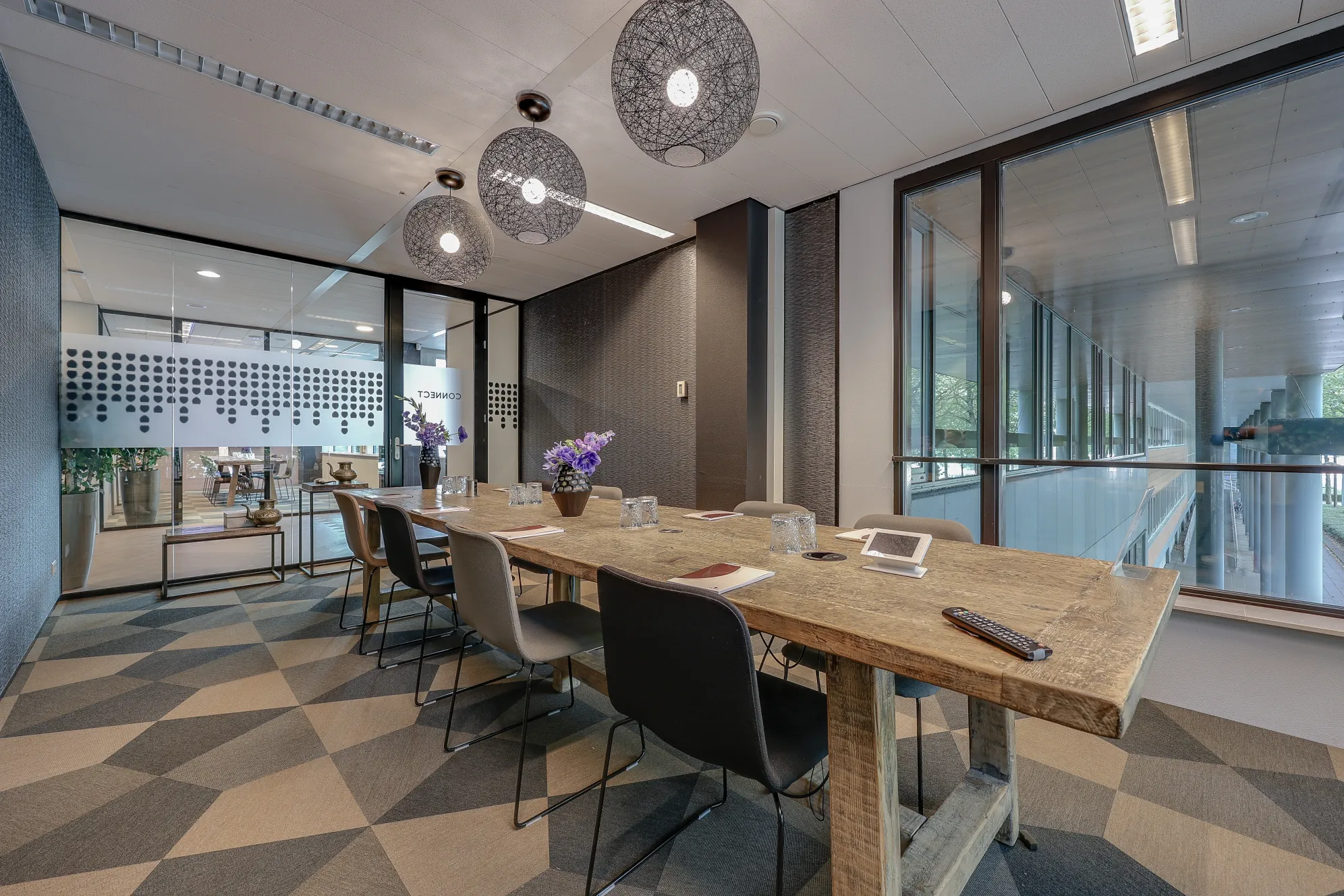 Tribes Amsterdam Adam Smith office lounge with warm atmosphere
